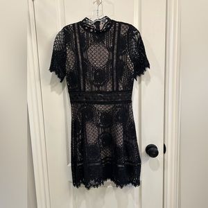 Black lace BB Dakota short sleeve dress with cream lining, zippered back, size 6